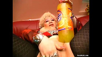 Play Granny masturbates with huge objects